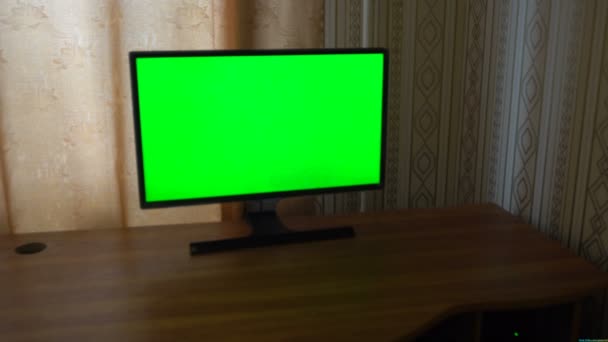 Male Hand With TV Remote Switching Channels On A Green Screen TV Point Of View — Stock Video