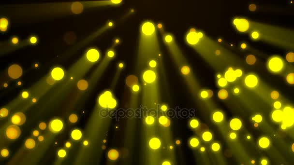 Loopable background flying golden particles in light beams — Stock Video