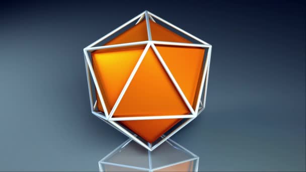 Созданный компьютером икосаэдр. Оранжевый платонический внутри решетки, 3D рендеринг геометрической формы — стоковое видео