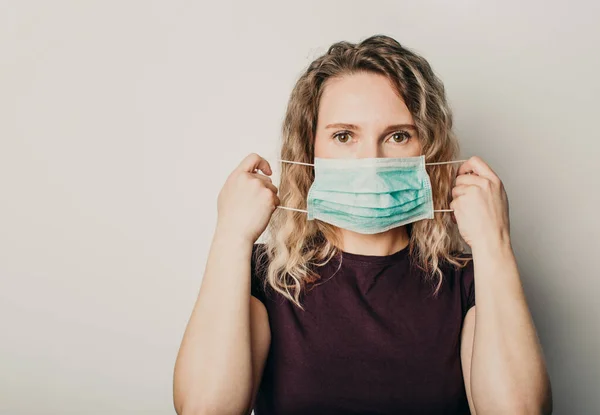 Woman in medical mask, personal protective equipment