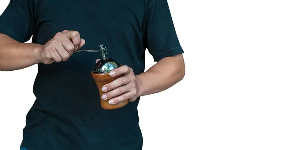 Bir adam işime Grind Kahve değirmeni beyaz arka plan üzerinde