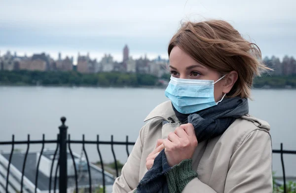 stock image Woman with a medical face mask at outdoor