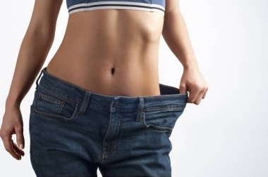 Successful weight loss, beautiful female waist, diet concept clipart