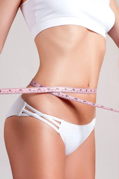 Successful weight loss, beautiful female waist, diet concept — Stock Photo, Image