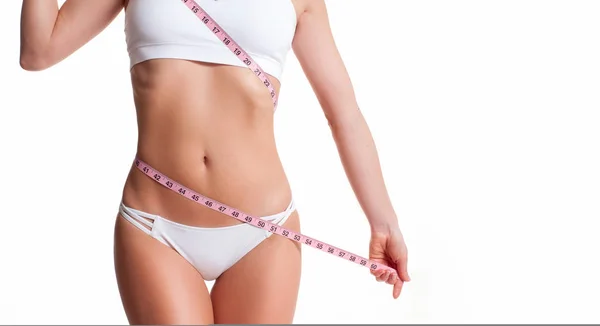 Succesvolle gewichtsverlies, mooie vrouwelijke taille, dieet concept — Stockfoto