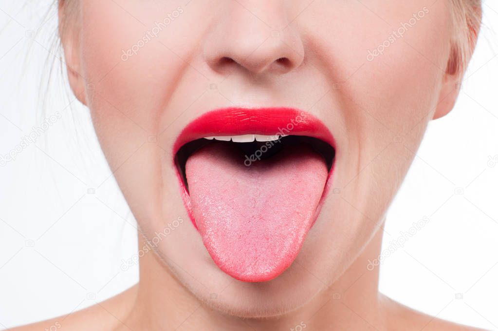 Female tongue and red painted lips