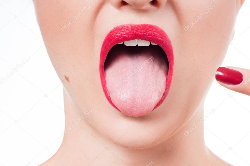 Female tongue and red painted lips