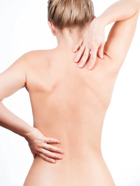 Woman from the back, naked body, pain concept Stock Photo