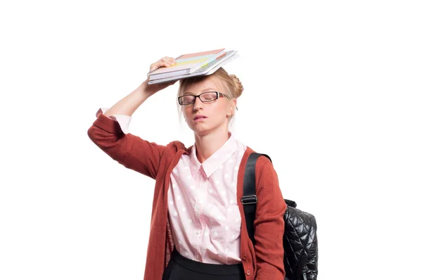 Irriterad ung student flicka håller böcker. Tillbaka till skolan — Stockfoto