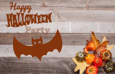 Kabaklar ve sonbahar yaprakları üzerinde ahşap arka plan. Cadılar Bayramı. Sonbahar konsepti