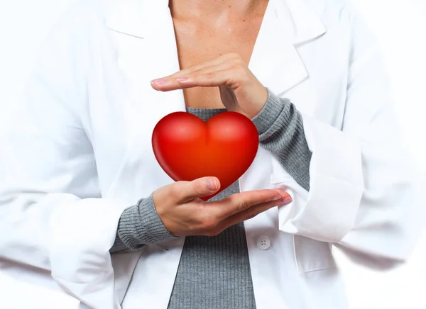 Female Doctor is making heart shape. Medical Concept — Stock Photo, Image