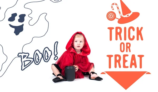 Little Red Riding Hood. Beautiful little girl in a red raincoat. Halloween