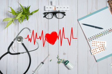 Tıbbi maddeler, stetoskop ve hapları ile doktor tablo