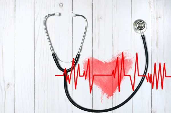 Stethoskop und rotes Herz mit Kardiogramm. Gesundheitskonzepte — Stockfoto