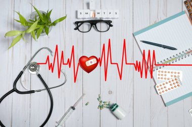 Tıbbi maddeler, stetoskop ve hapları ile doktor tablo