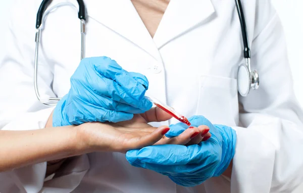 Doctor and patient. Finger blood test. — Stock Photo, Image