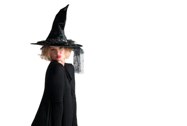 Happy woman in witch halloween costume with hat — Stock Photo, Image