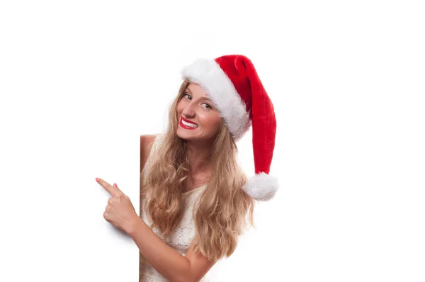 Χριστούγεννα. Όμορφη γυναίκα να φοράτε καπέλο Σάντα — Φωτογραφία Αρχείου