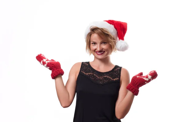 Christmas. Beautiful woman wear santa hat and mittens — Stock Photo, Image