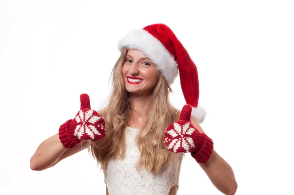 Χριστούγεννα. Όμορφη γυναίκα να φοράτε καπέλο santa και γάντια — Φωτογραφία Αρχείου