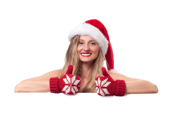 Christmas. Beautiful woman wear santa's hat and mittens — Stock Photo, Image