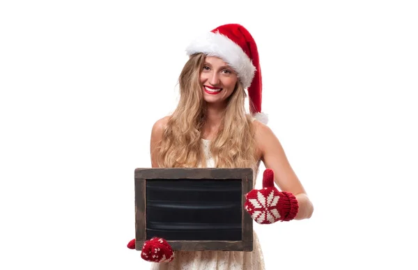 Natal. Wanita cantik memakai topi santa — Stok Foto