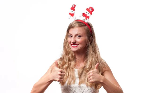 Christmas. Happy beautiful woman showing thumb up — Stock Photo, Image