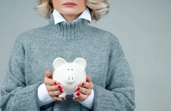 Savings concept. Woman holding piggy bank — Stock Photo, Image