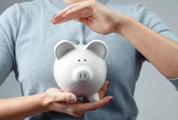 Savings concept. Woman holding piggy bank — Stock Photo, Image
