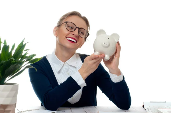 Business woman is holding piggy bank. Saving concept — Stock Photo, Image