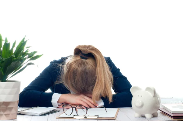 Overworked and tired young woman sleeping on desk at office — Stock Photo, Image