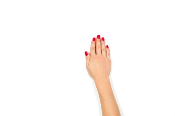 Hermosa mano femenina con manicura roja —  Fotos de Stock