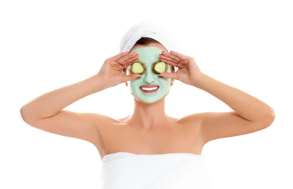 Beautiful woman with clay mask on white background. Beauty and spa — Stock Photo, Image