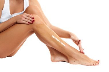 Epilasyon ve ağda. Depilatory mum bacağı üzerinde koyarak kadın