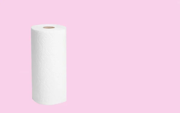 Paper towel roll on pastel pink background — Stock Photo, Image