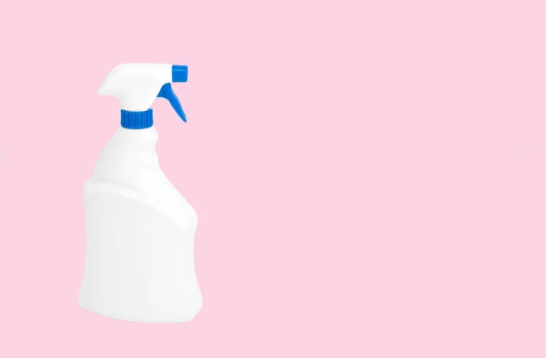 Detergent cleaners on a pastel pink background. — Stock Photo, Image