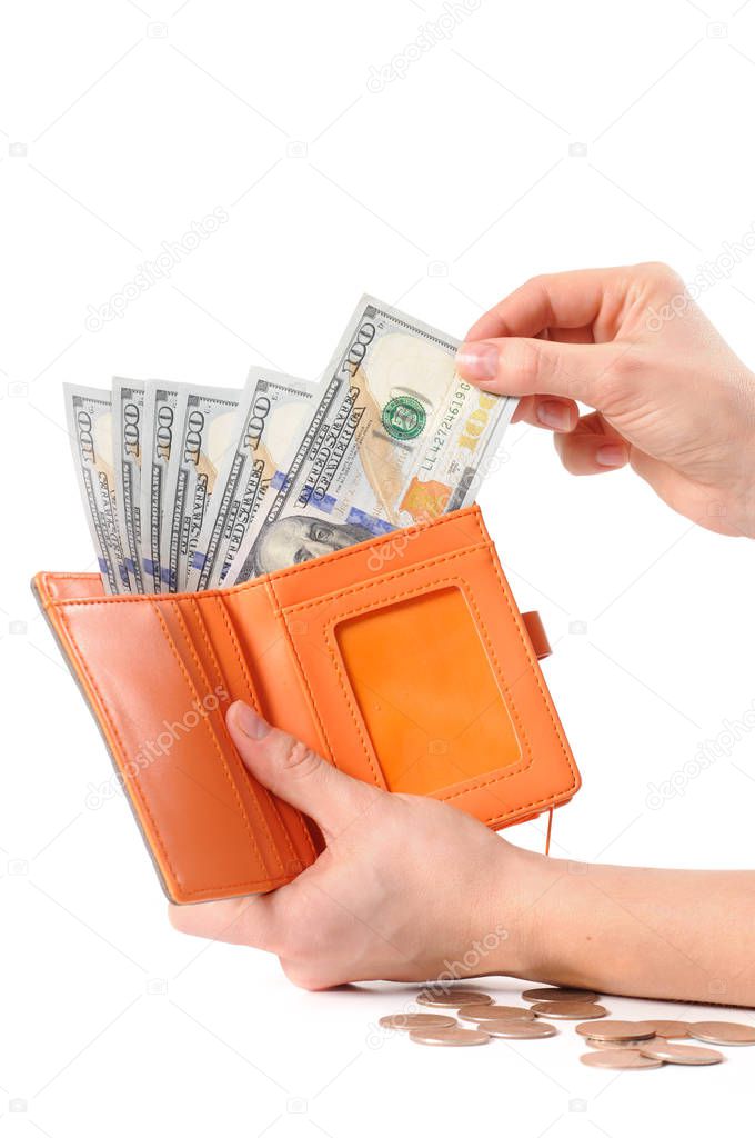  American dollars. Hands taking out money from wallet. 