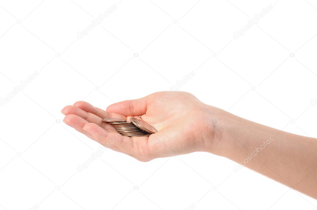 Female hands with coins on white background