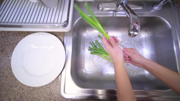 Woman Washing Green Onions Running Water Kitchen Sink — Stock Video