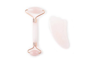 Yeşim silindirli. Güzel yüz masajı terapisi için yeşim yüz silindiri.