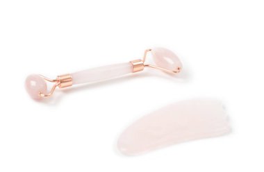 Yeşim silindirli. Güzel yüz masajı terapisi için yeşim yüz silindiri.