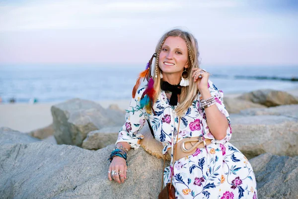 Beautiful woman wearing long dress and accessories boho style. Bohemian style girl on the beach — Stock Photo, Image