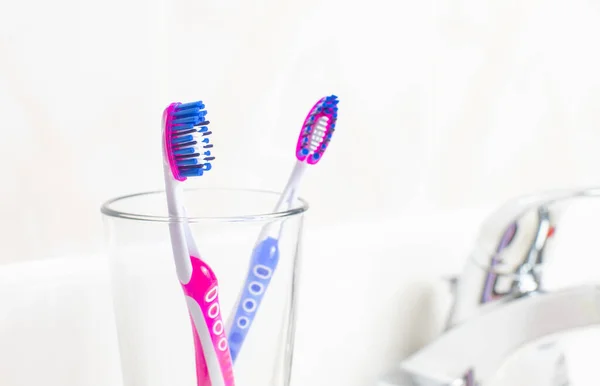 Dental Hygiene Tooth Brushes Glass Bathroom — Stock Photo, Image