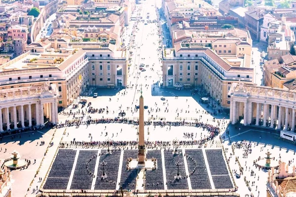 Long queue of visitors waiting to enter in St. Peter\'s basilica in Vatican.
