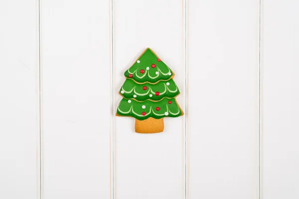 Jul Pepparkaka på vit trä bakgrund. Utrymme för text — Stockfoto