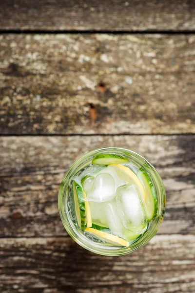 Detox water with cucumber and lemon .