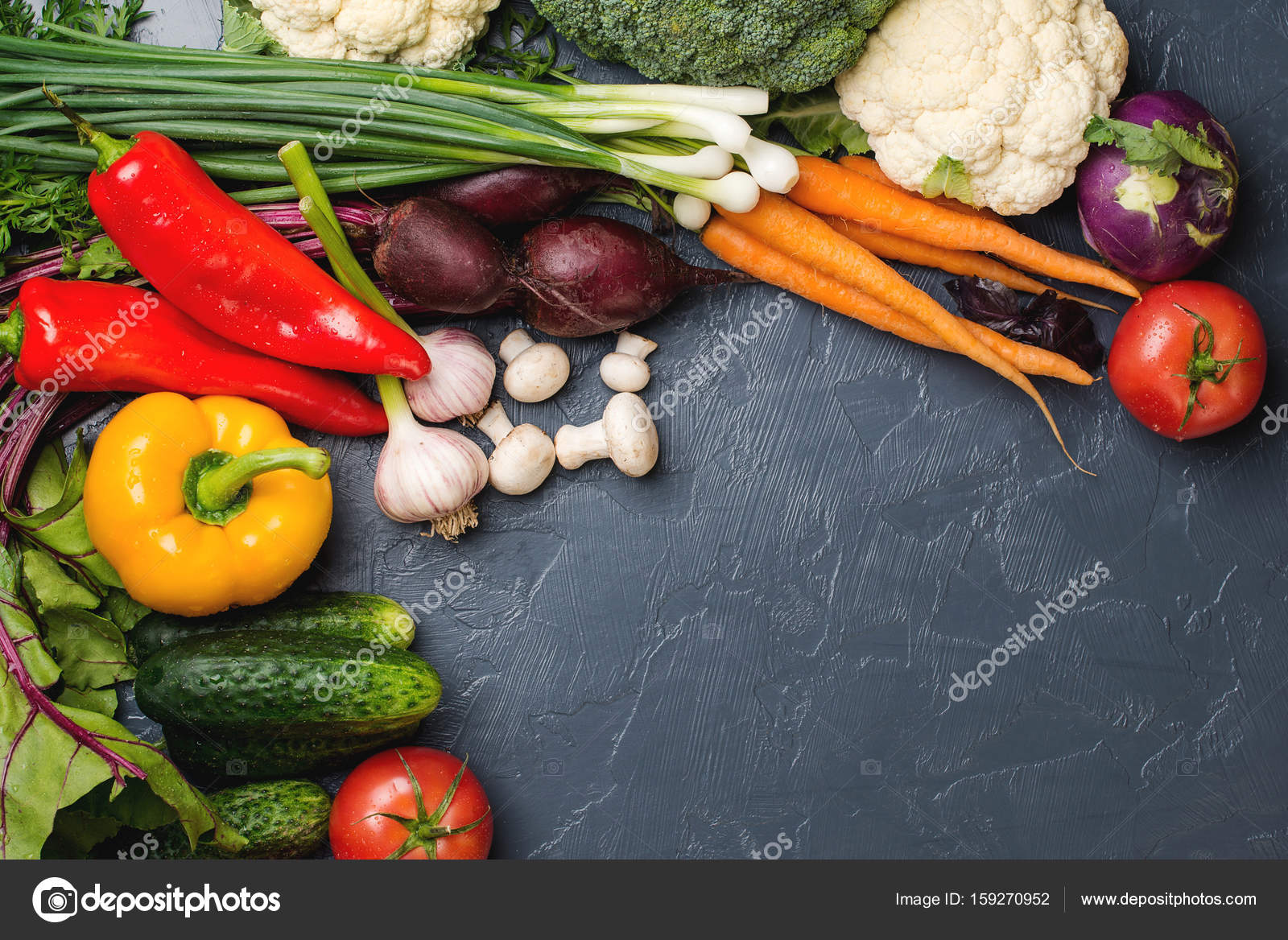 Colorful vegetables background. Fresh vegetables on black backgr Stock