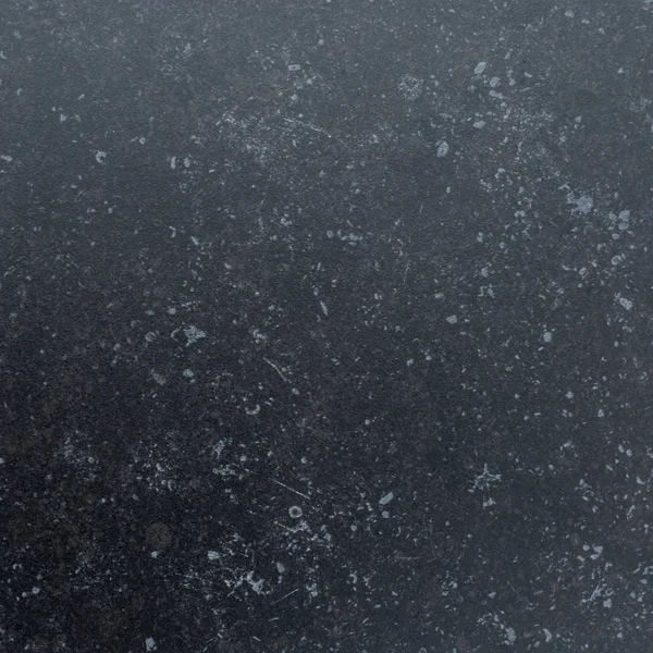 Svarta ytan med fläckar, bakgrund, textur — Stockfoto