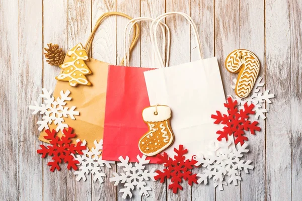 Christmas background with colorful paper bags. Flat lay. Christmas sale and shopping concept. — Stock Photo, Image