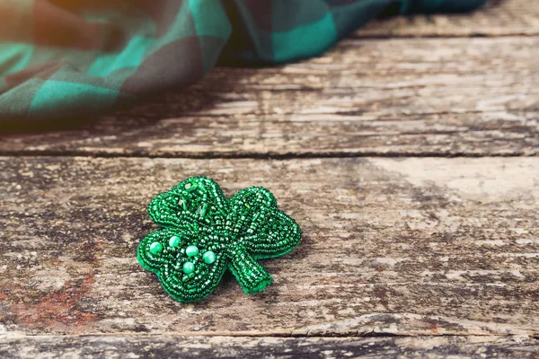 Beautiful brooch in the form of clover. — Stock Photo, Image